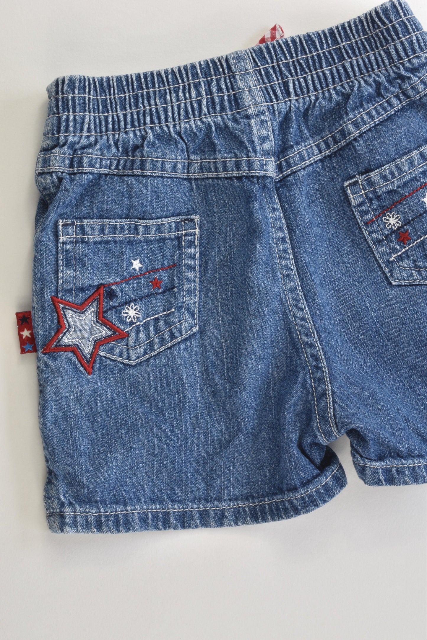 OshKosh Size 0 (12 months) Stars Denim Shorts