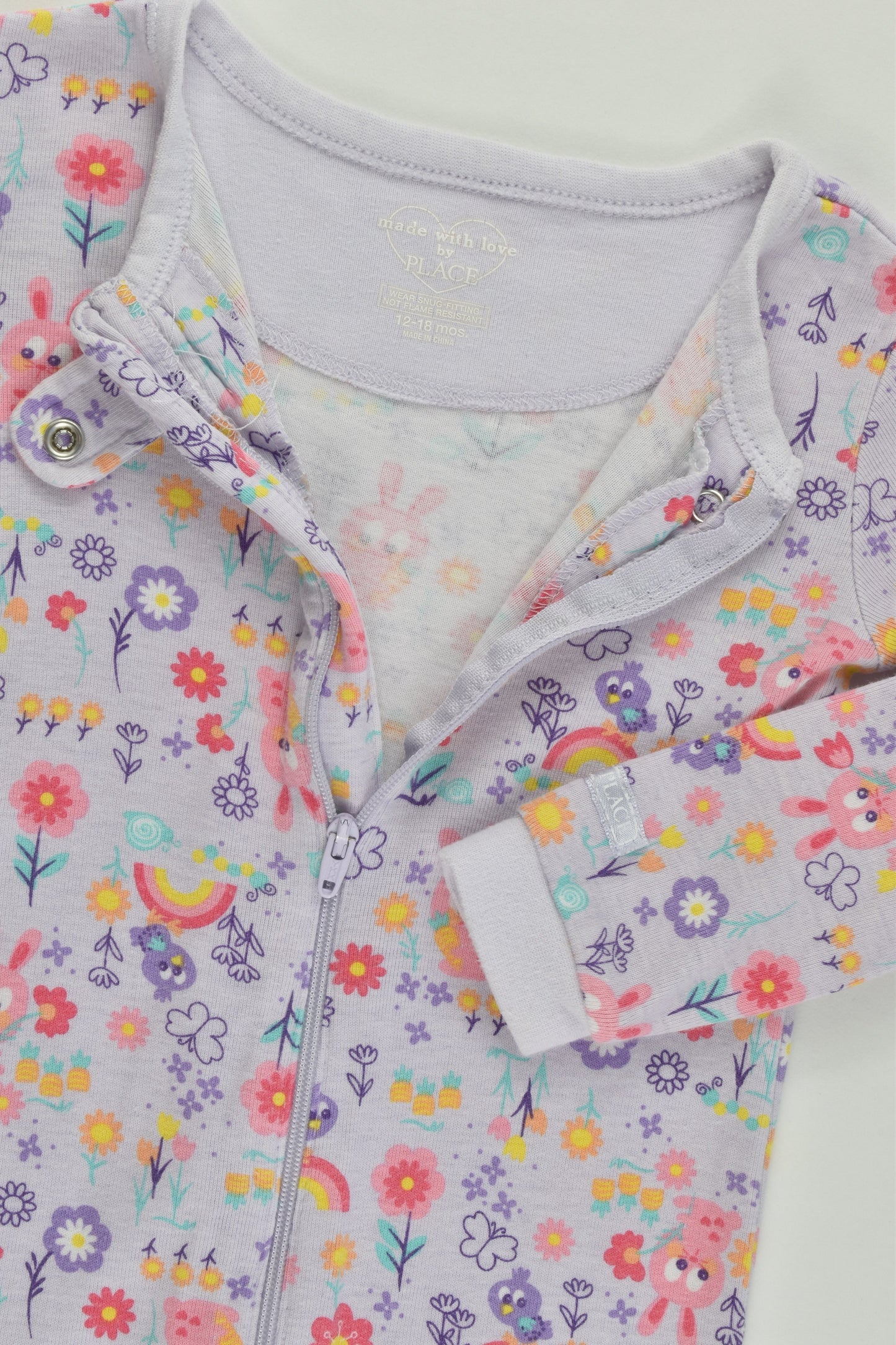 Place Size 1 (12-18 months) Bunnies and Rainbows Footed Romper