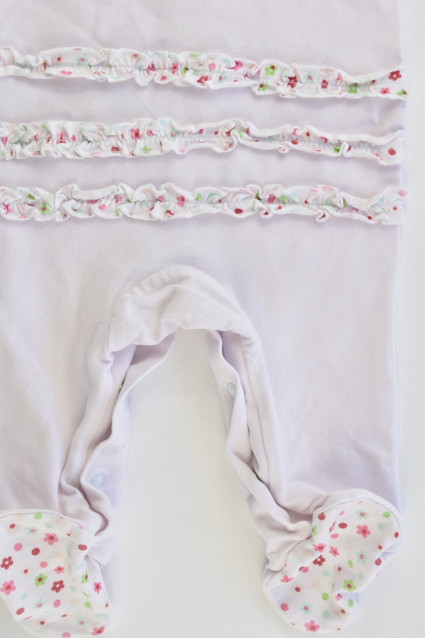 Sprout Size 000 Flowers and Ruffle at the Back Footed Romper
