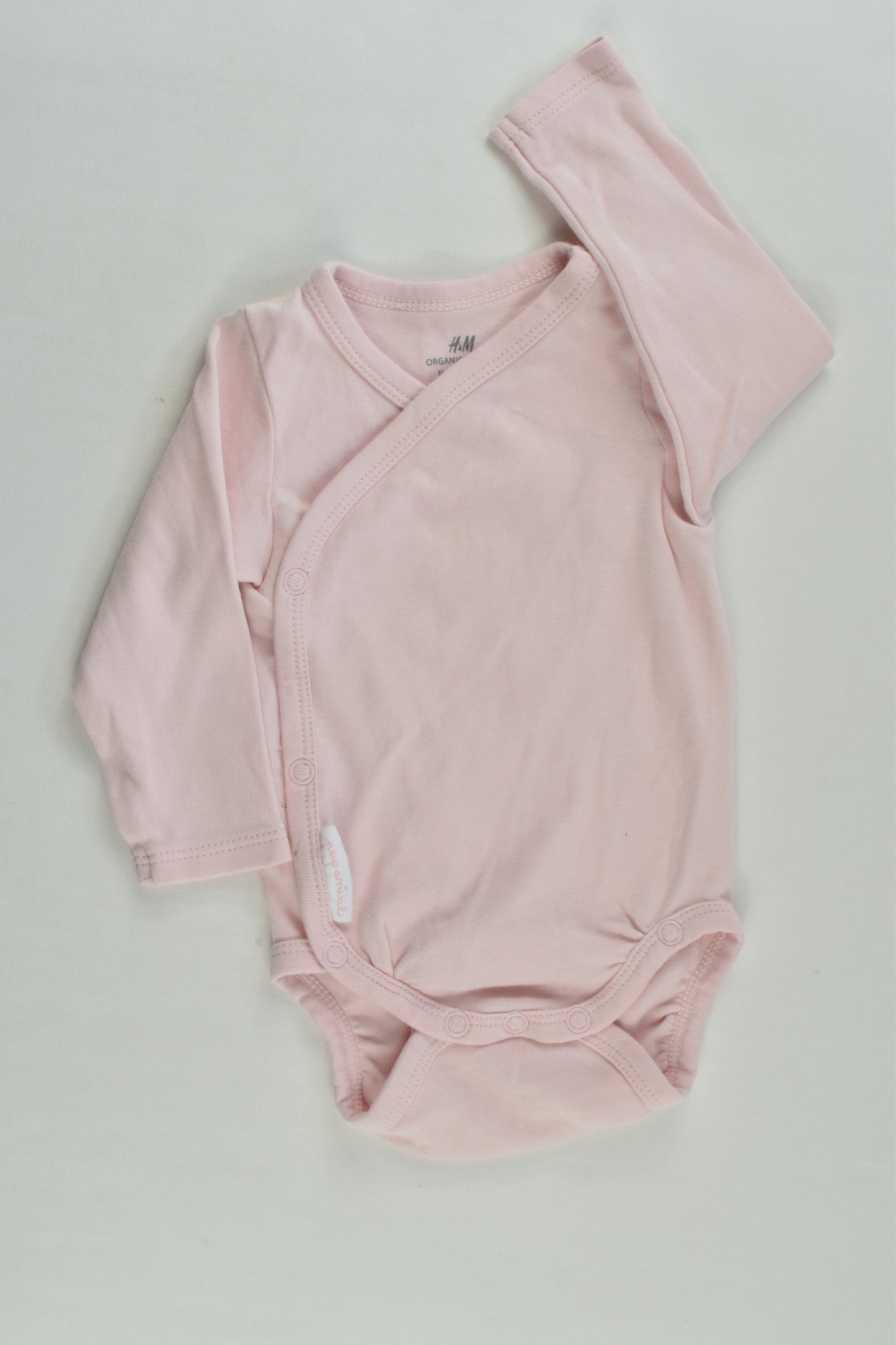 H&M Size 0000 (56 cm) 'New Arrival' Organic Wrap Bodysuit