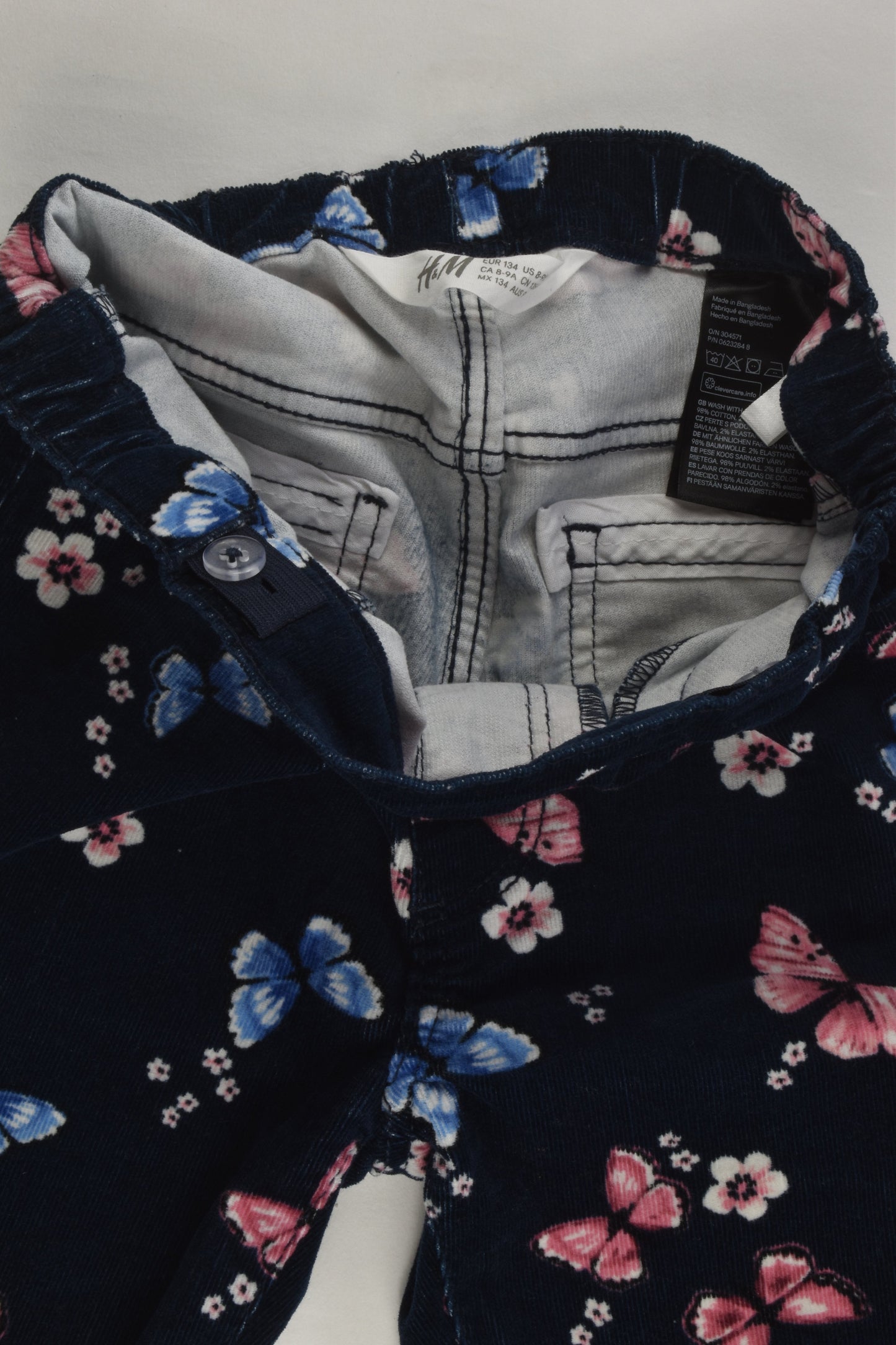 H&M Size 9 (134 cm) Flowers and Butterflies Stretchy Cord Pants