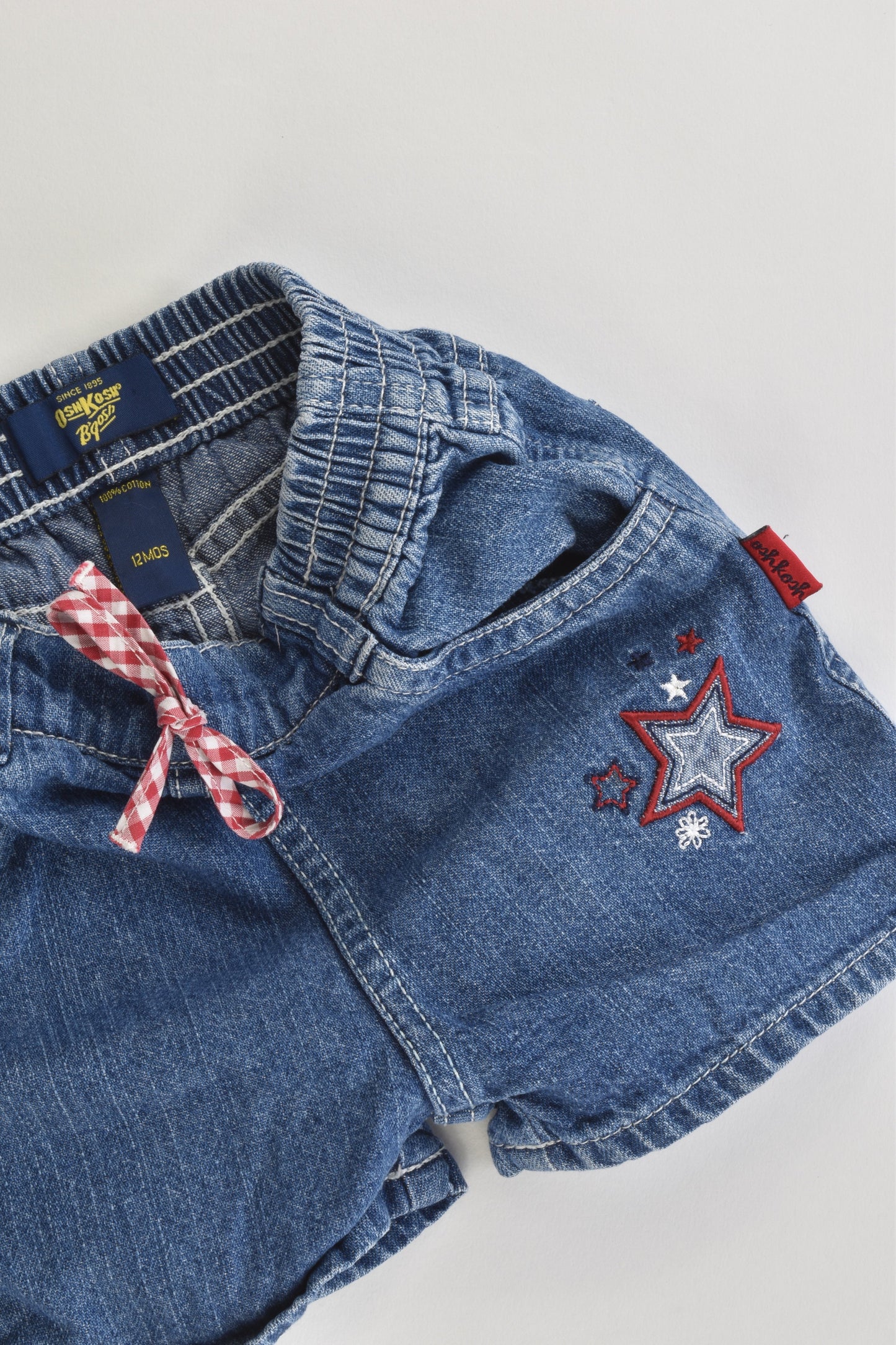 OshKosh Size 0 (12 months) Stars Denim Shorts