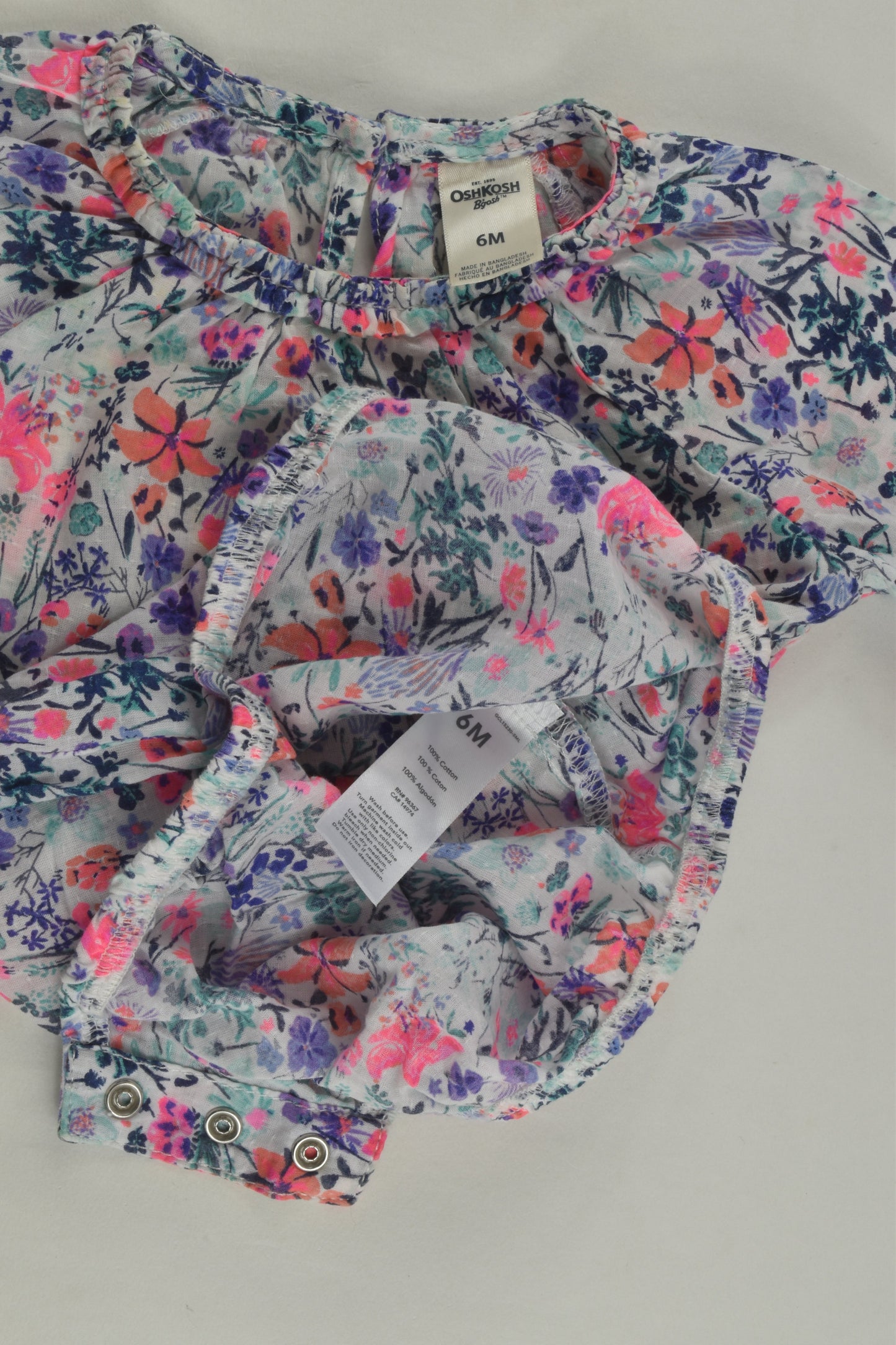 OshKosh Size 00 (6 months) Floral Romper